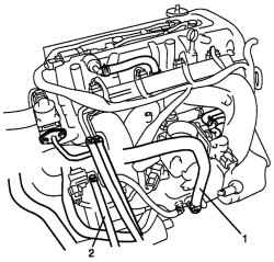 Шланги усилителя тормозов 1 и шланг 2 клапана продувки фильтра системы улавливания паров бензина