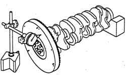 Измерение торцевого биения маховика индикатором часового типа