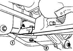 Расположение болта (1) и гайки (2) крепления нижнего продольного рычага передней подвески